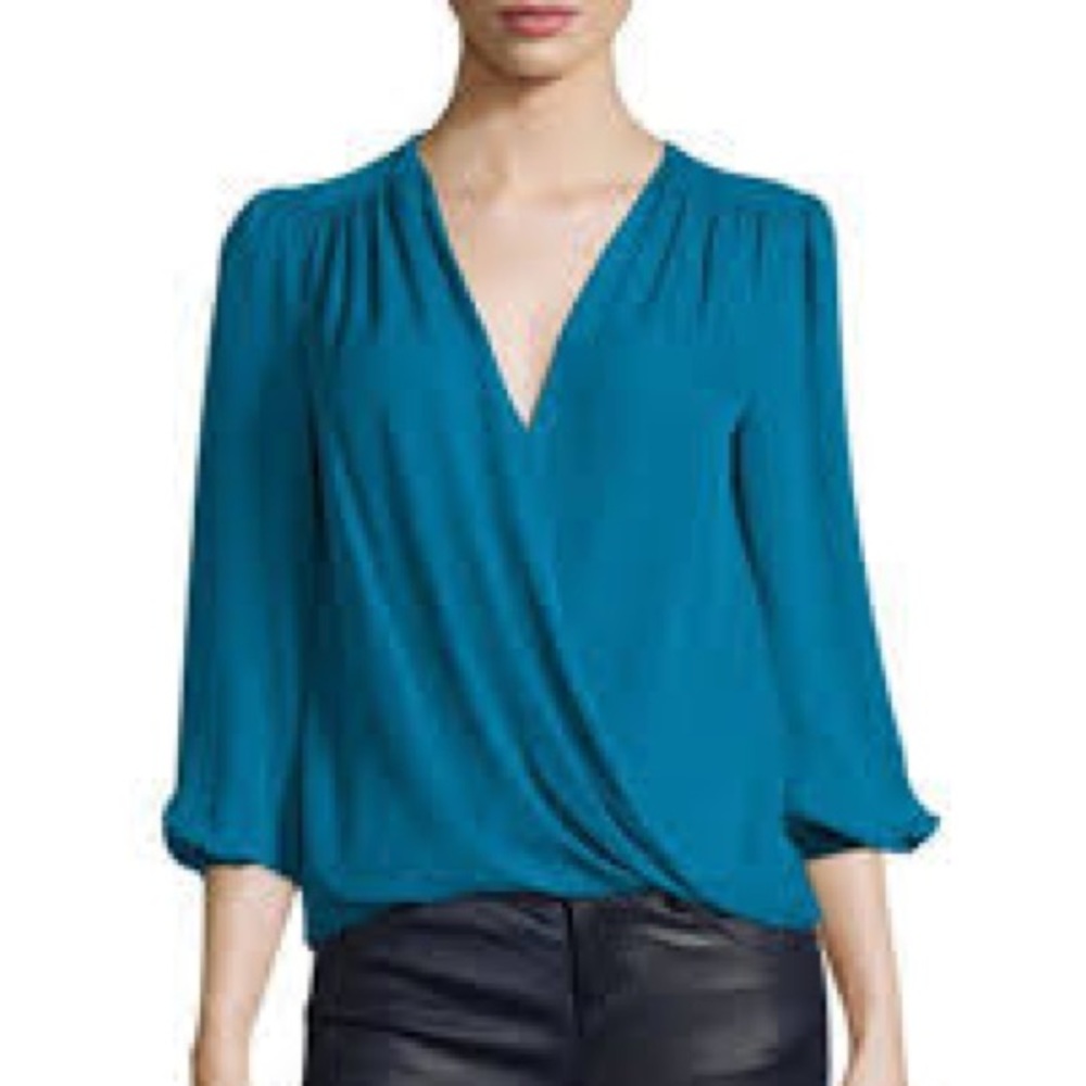 Alive and Olivia blue crossover shirt. Clasp missing.